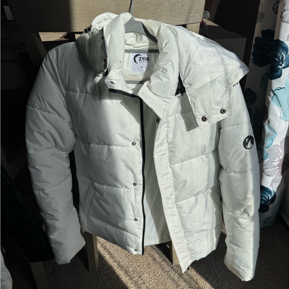 Zyia white puffer jacket.